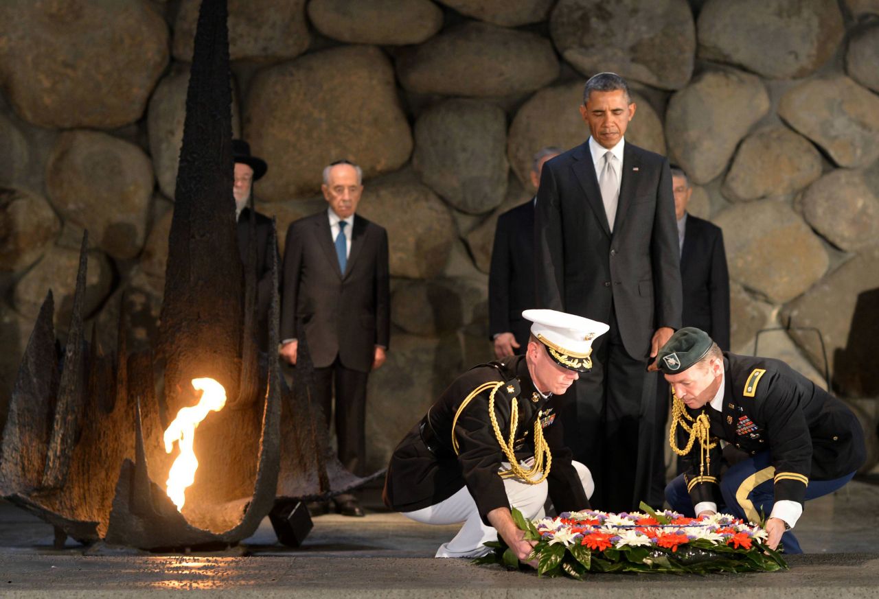 Obama pays his respects in the Hall of Remembrance at Yad Vashem on March 22 as Marines lay a wreath on his behalf.  
