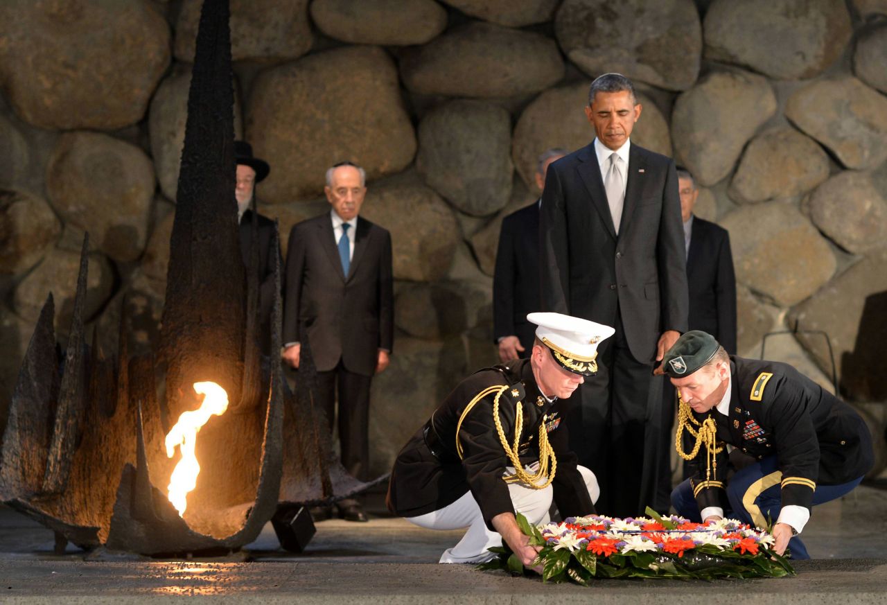 Obama pays his respects in the Hall of Remembrance at Yad Vashem on March 22 as Marines lay a wreath on his behalf.