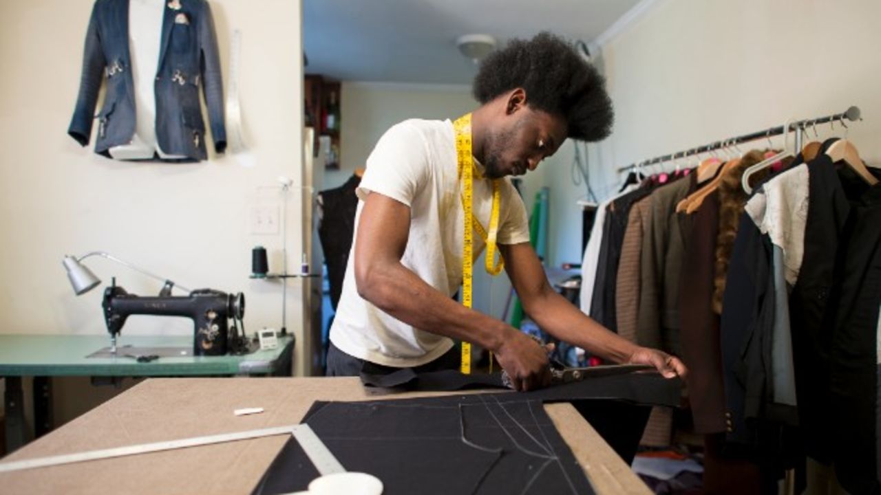 Aspiring designer Afriyie Poku rarely left his Atlanta home as he prepared for Charleston Fashion Week.
