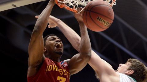 Melvin Ejim of the Iowa State Cyclones, left, dunks against Tom Knight of the Notre Dame Fighting Irish on March 22 in Dayton, Ohio.