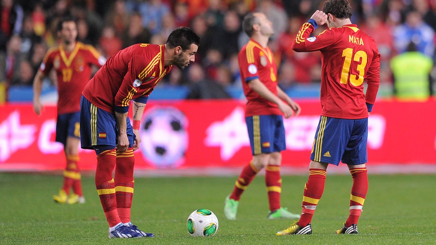Spain's players show their disappointment after conceding a late equalizer at home to Finland in a World Cup qualifier in Gijon.  