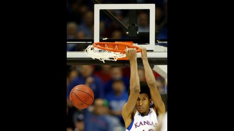Kevin Young of the Kansas Jayhawks dunks against the Western Kentucky Hilltoppers on March 22.