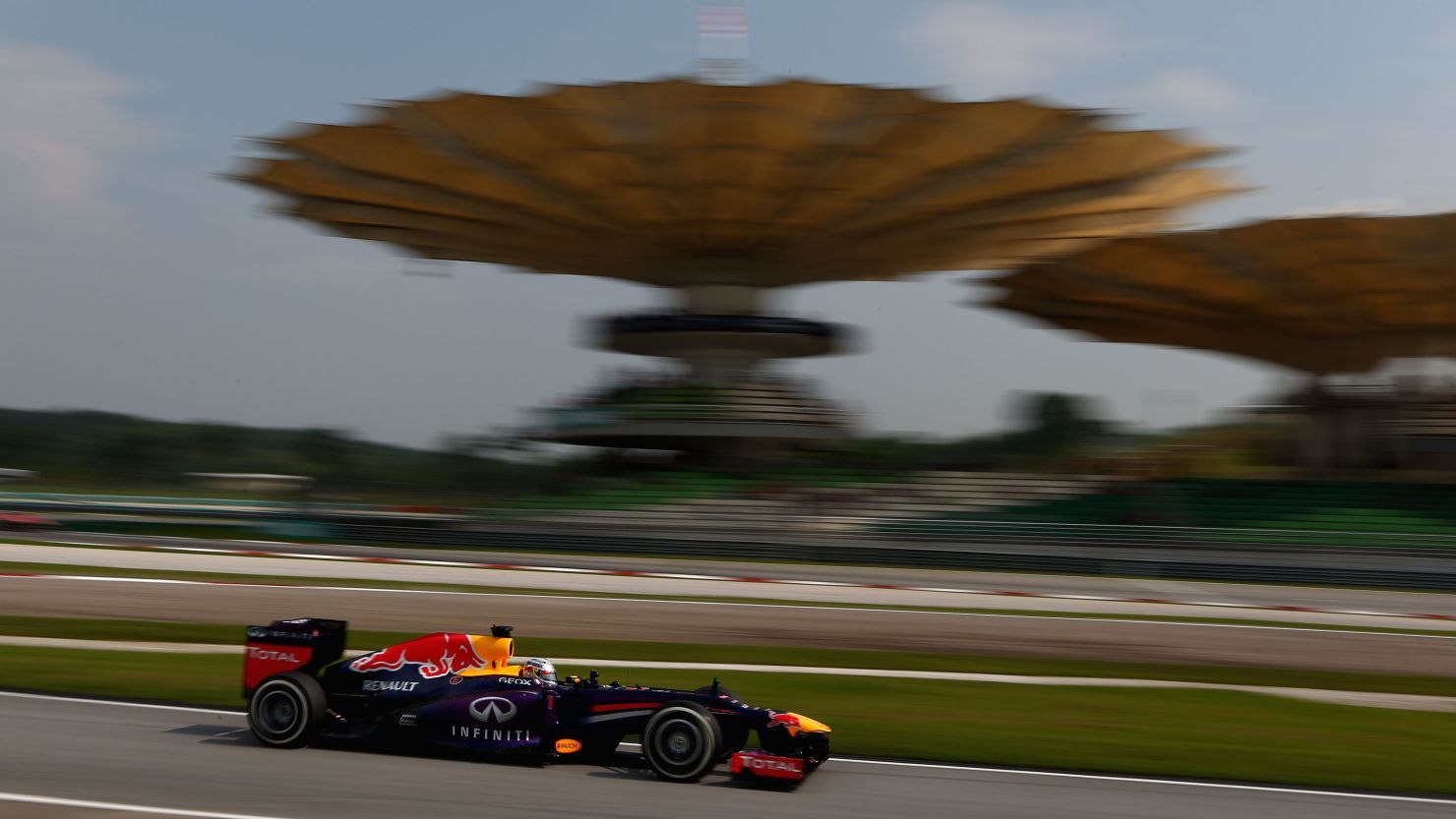 Red Bull's Sebastian Vettel will start on pole position at Sunday's Malaysian Grand Prix.