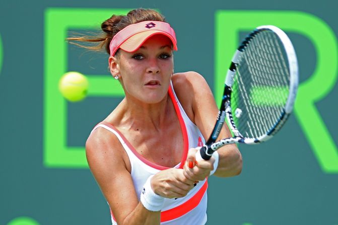 Agnieszka Radwanska edged through to the fourth round after seeing off Magadalena Rybarikova in three sets. Radwanska, the defending champion, won the first set 7-5 before losing the second 6-2.  But the Pole, ranked fourth in the world, hit back to take the decider 6-3. She will face Sloane Stephens in the next round.