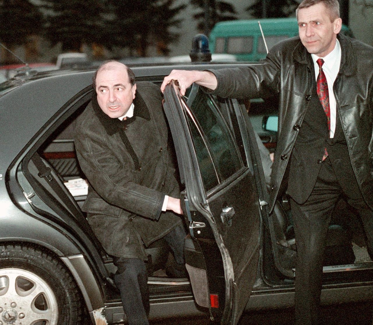 Boris Berezovsky began his working life as a math professor, and then a systems analyst, before switching to more lucrative jobs, according to CNN's Jill Dougherty. He is pictured here at Moscow airport in 1999.