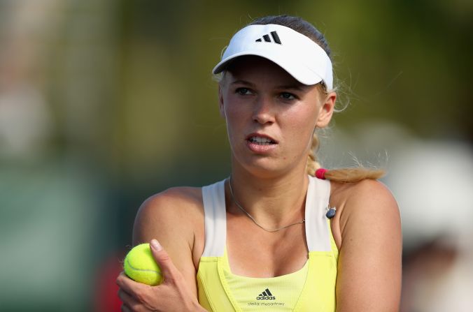 World No.9 Caroline Wozniacki suffered a shock defeat by Spain's Garbine Muguruza -- a woman ranked 64 places below the Dane.  Muguruza needed just 81 minutes to claim a 6-2 6-4 win and leave her opponent stunned.