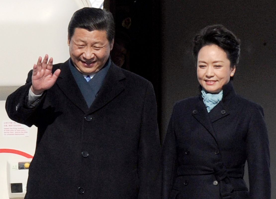 Chinese President Xi Jinping and his wife Peng Liyuan get off the plane at Vnukovo airport outside Moscow on March 22.