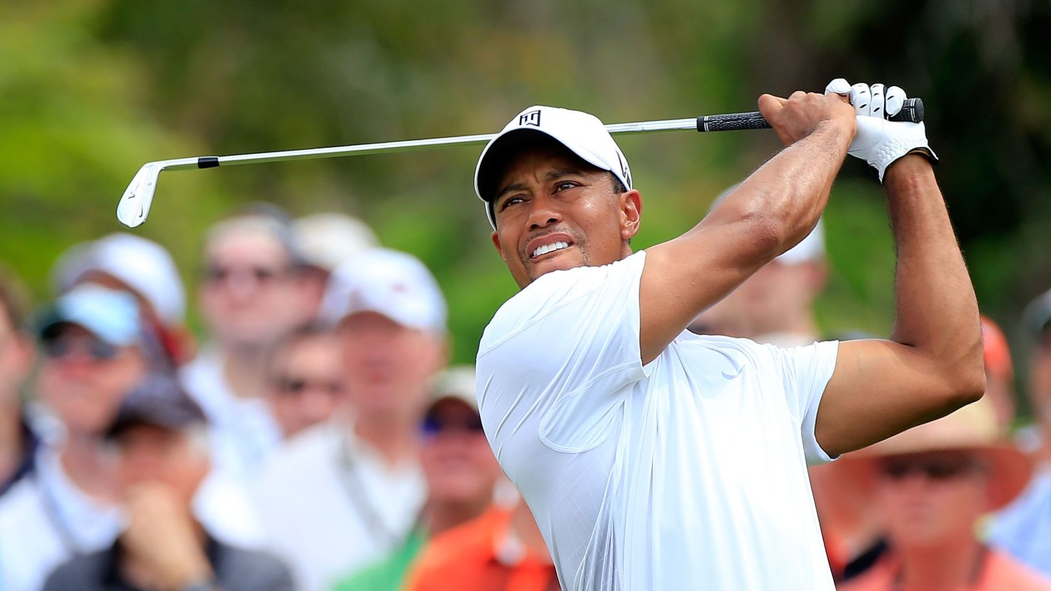 Tiger Woods will go into Sunday's final round of the Arnold Palmer Invitational with a two-shot lead.