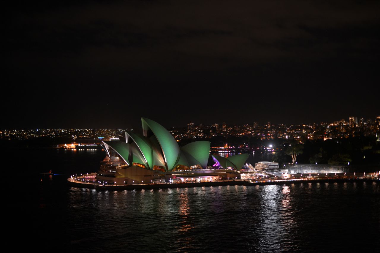 This picture shows the Sydney Opera House illluminated shortly before the start of the annual Earth Hour.