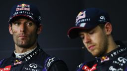 An unhappy Mark Webber, left, with Red Bull teammate Sebastian Vettel at the postrace press conference in Malaysia. 