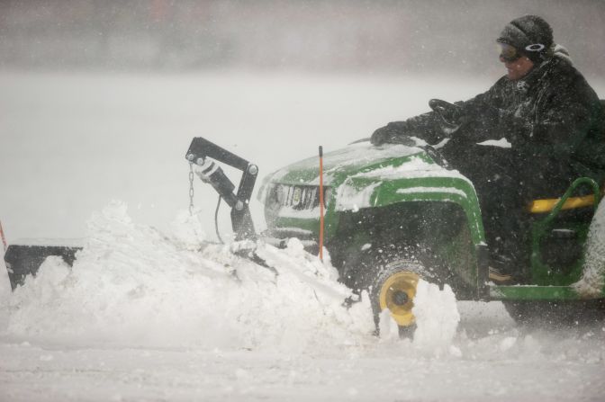 Heavy machinery was brought onto the pitch in an attempt to get the match on.