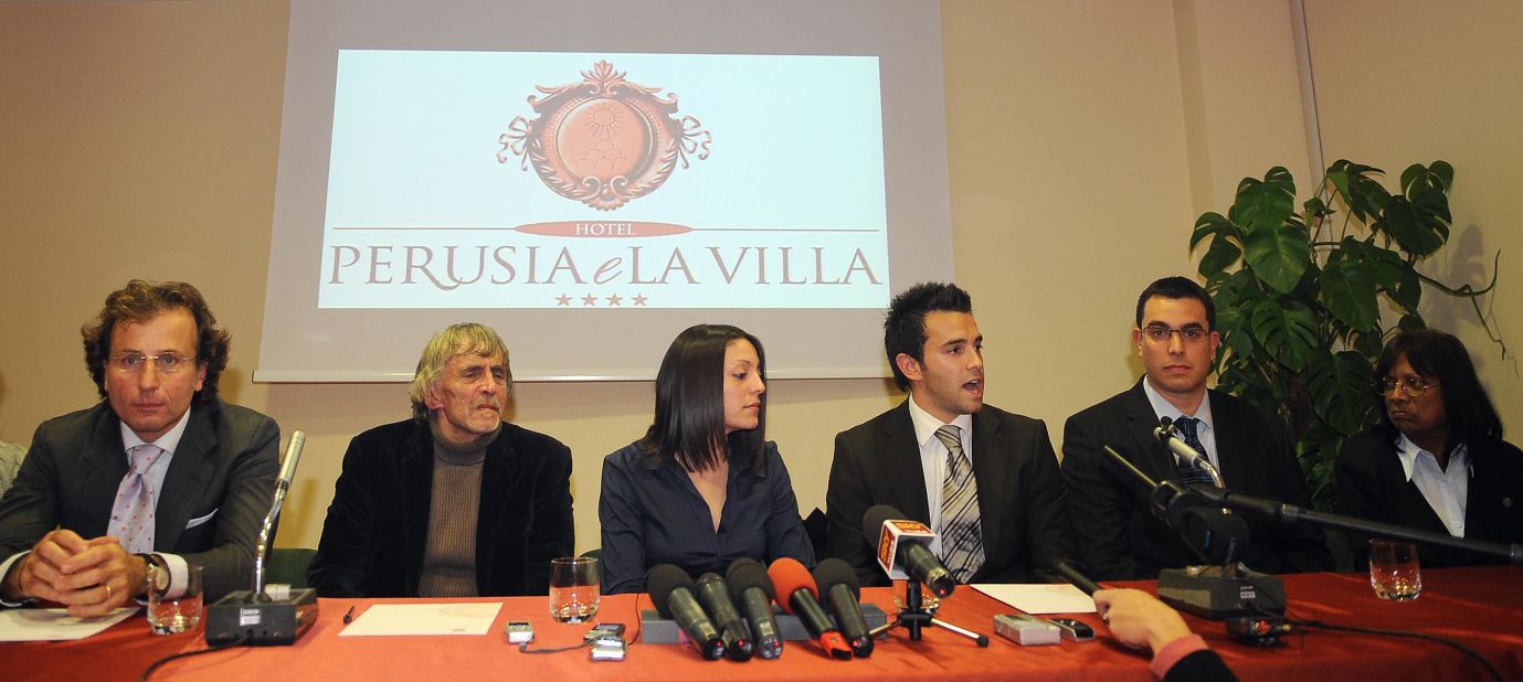 Meredith Kercher's family lawyer Francesco Maresca, left, argued in court in 2011 that the multiple stab wounds implied more than one aggressor killed Kercher. Pictured from left are Maresca, Kercher's father John, sister Stephanie, brother Lyle and brother John at a press conference in 2008.