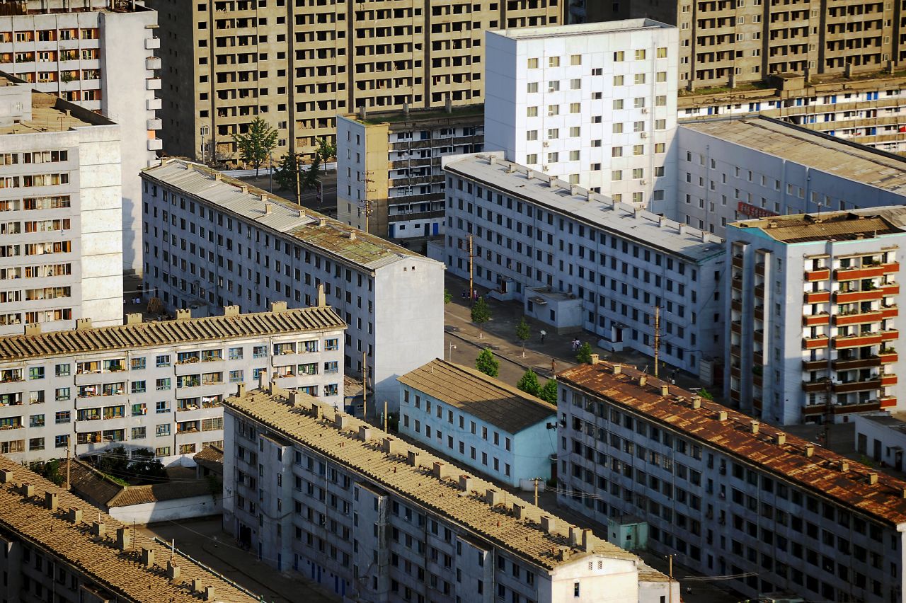 An aerial view of part of Pyongyang. I found North Korean architecture to be simple and unremarkable. The majority of buildings are residential houses of a few stories. After dusk, much of the city is hidden in the dark, adding to the feeling of it being something of a ghost town.