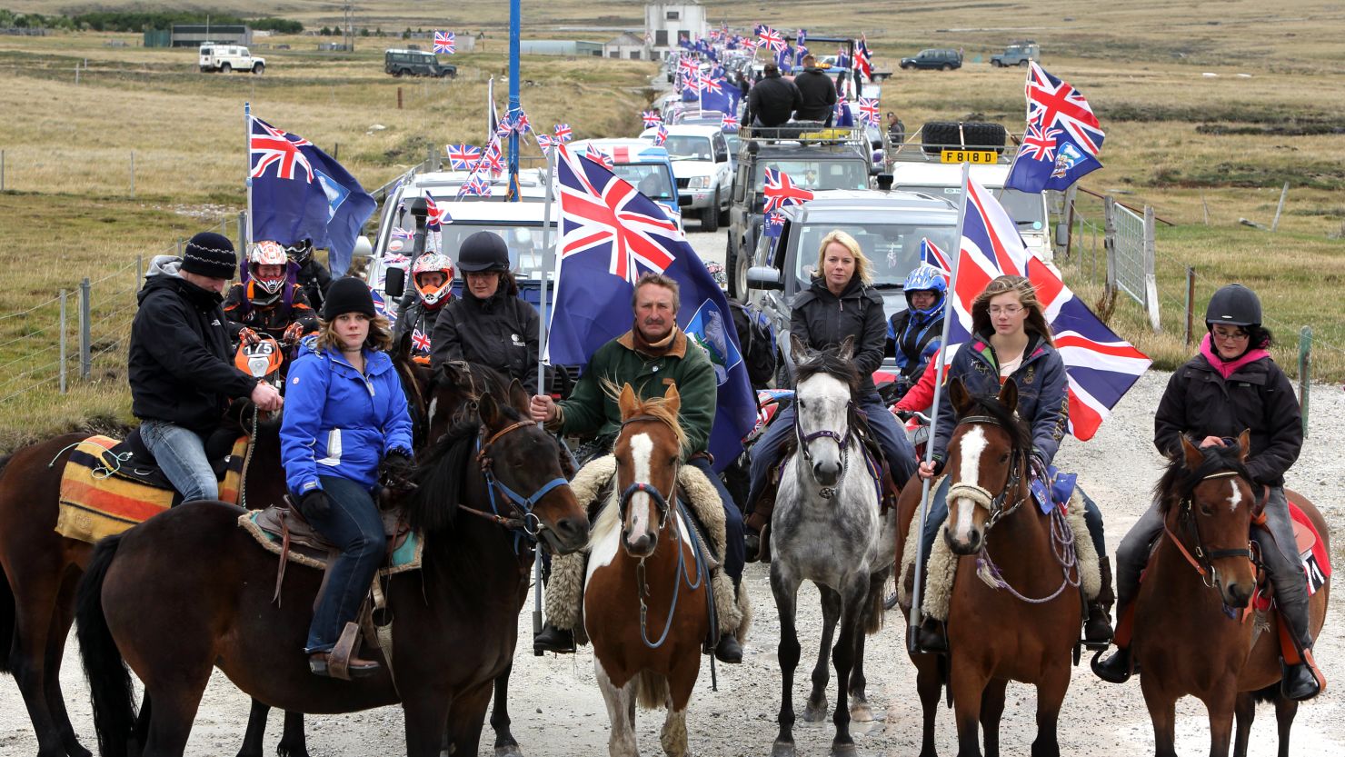 Falkland Islanders take part in the "Proud to be British" parade along Ross Road in Port Stanley on March 10.  