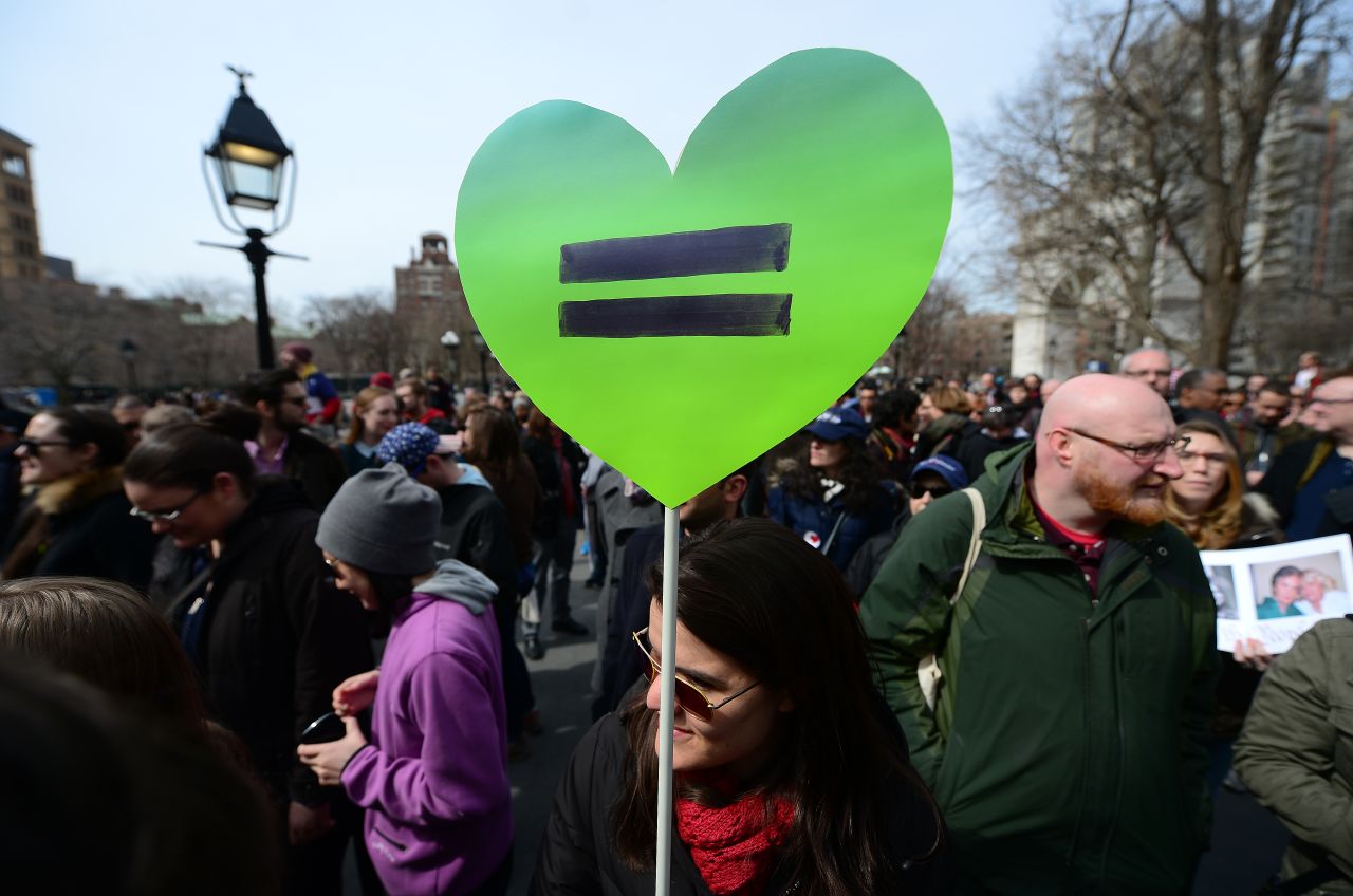 People move through the demonstration in New York on March 24.