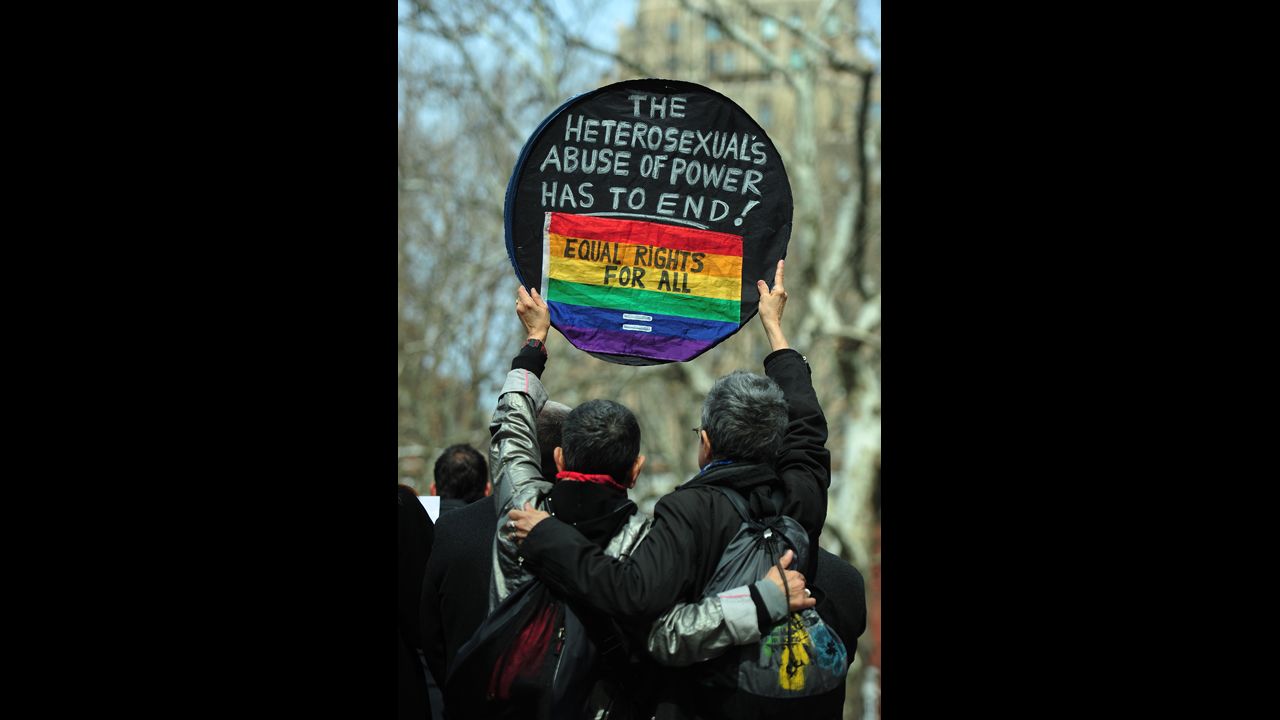 Marriage equality supporters take part in a march in New York on Sunday, March 24.