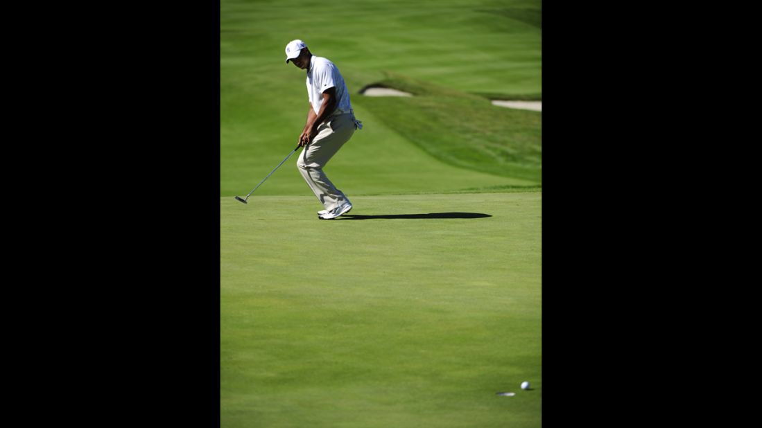 Woods misses a putt at the Frys.com Open in October 2011. That month, he fell out of golf's top 50 for the first time in almost 15 years. Woods reportedly lost millions in endorsements after sponsors ended their ties with him in the wake of his sex scandal.