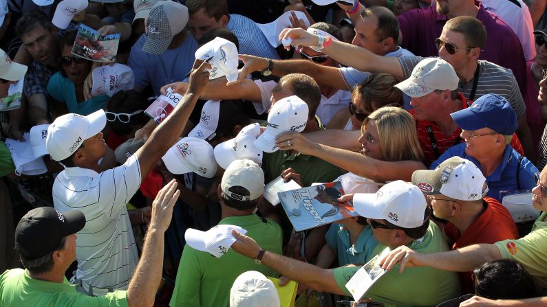 Woods signs autographs at the<a href="index.php?page=&url=http%3A%2F%2Fwww.cnn.com%2F2012%2F03%2F25%2Fsport%2Fgolf%2Fgolf-arnold-palmer-tiger%2Findex.html"> Arnold Palmer Invitational</a> in March 2012. His win there marked his first PGA Tour victory since September 2009.