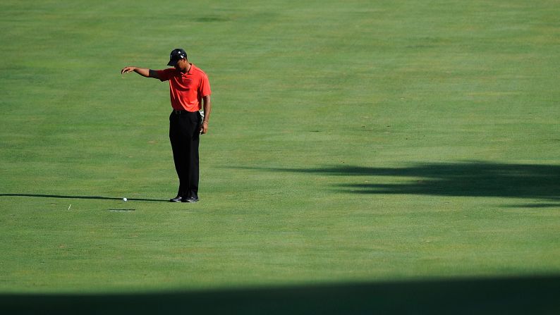 Woods drops the ball on the 15th fairway during the final round of the AT&T National in July 2012. <a href="index.php?page=&url=http%3A%2F%2Fwww.cnn.com%2F2012%2F07%2F02%2Fsport%2Fgolf%2Fgolf-woods-congressional-nicklaus%2Findex.html">He overtook Jack Nicklaus</a> for second place on the all-time PGA Tour victory list and now has 79 overall -- three behind Sam Snead's record.