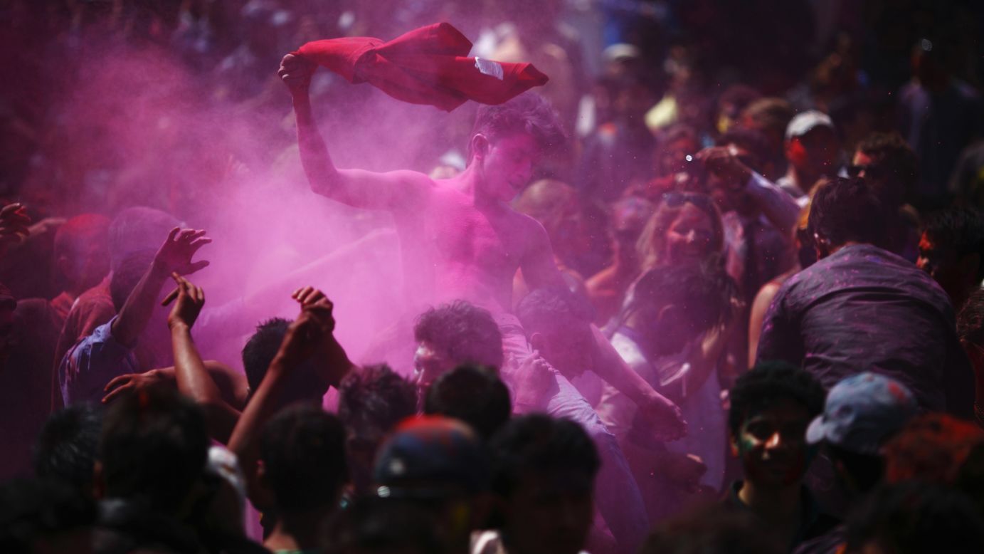 People celebrate Holi in Kathmandu, Nepal, on March 26.
