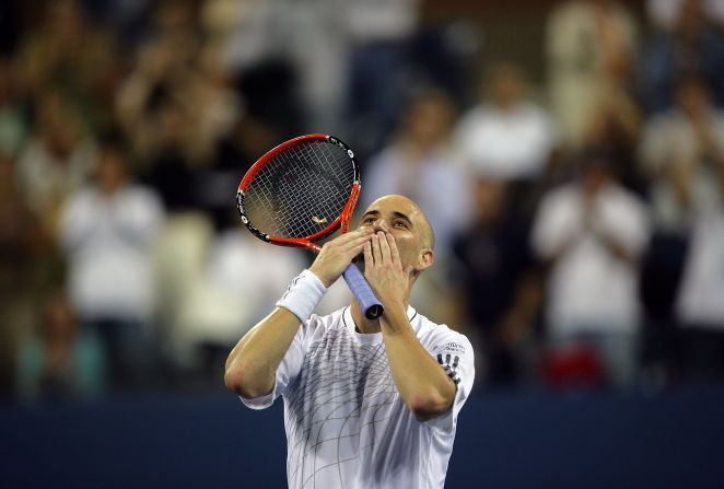 Agassi blows kisses to the crowd after winning his first round match at the 2006 U.S. Open. But he would retire from the sport at the age of 36 after losing to Germany's Benjamin Becker in the third round.