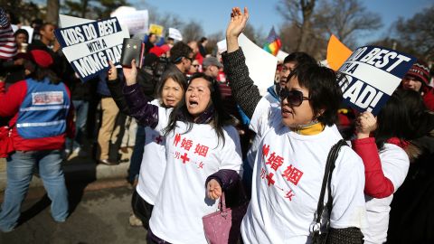 Protesters on both sides of the issue gather Tuesday.