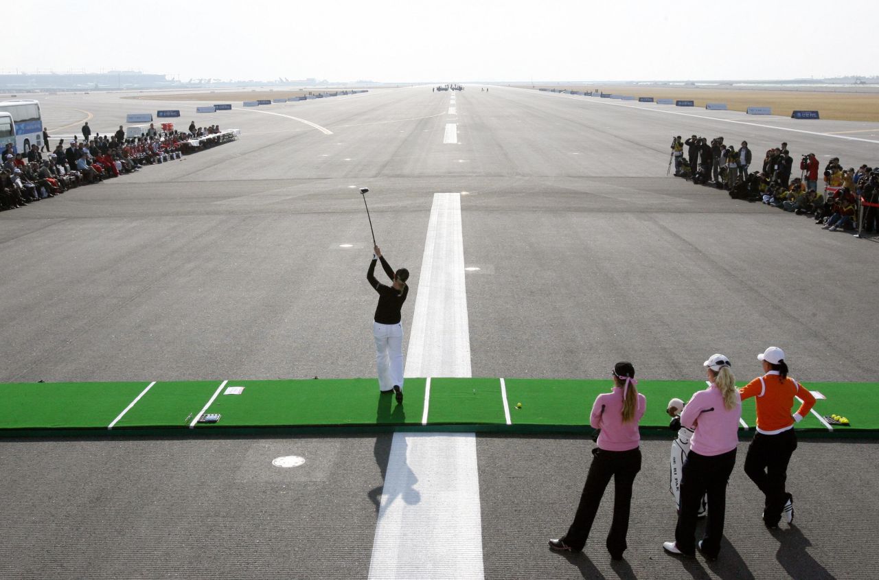 Sweden's LPGA star Annika Sorenstam tees-off from the runaway of Incheon International Airport during a promotional longest drive contest. While travelers aren't advised to take to the tarmac to practice their long-game, the nearby 18-hole Incheon Golf Club is open to passengers with a few hours to spare.