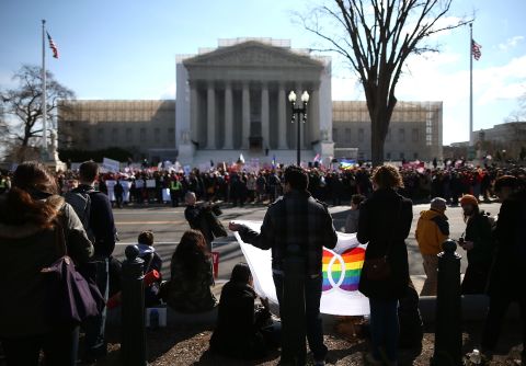 Demonstrators from both sides of the same-sex marriage debate gather in front of the U.S. Supreme Court on Wednesday.