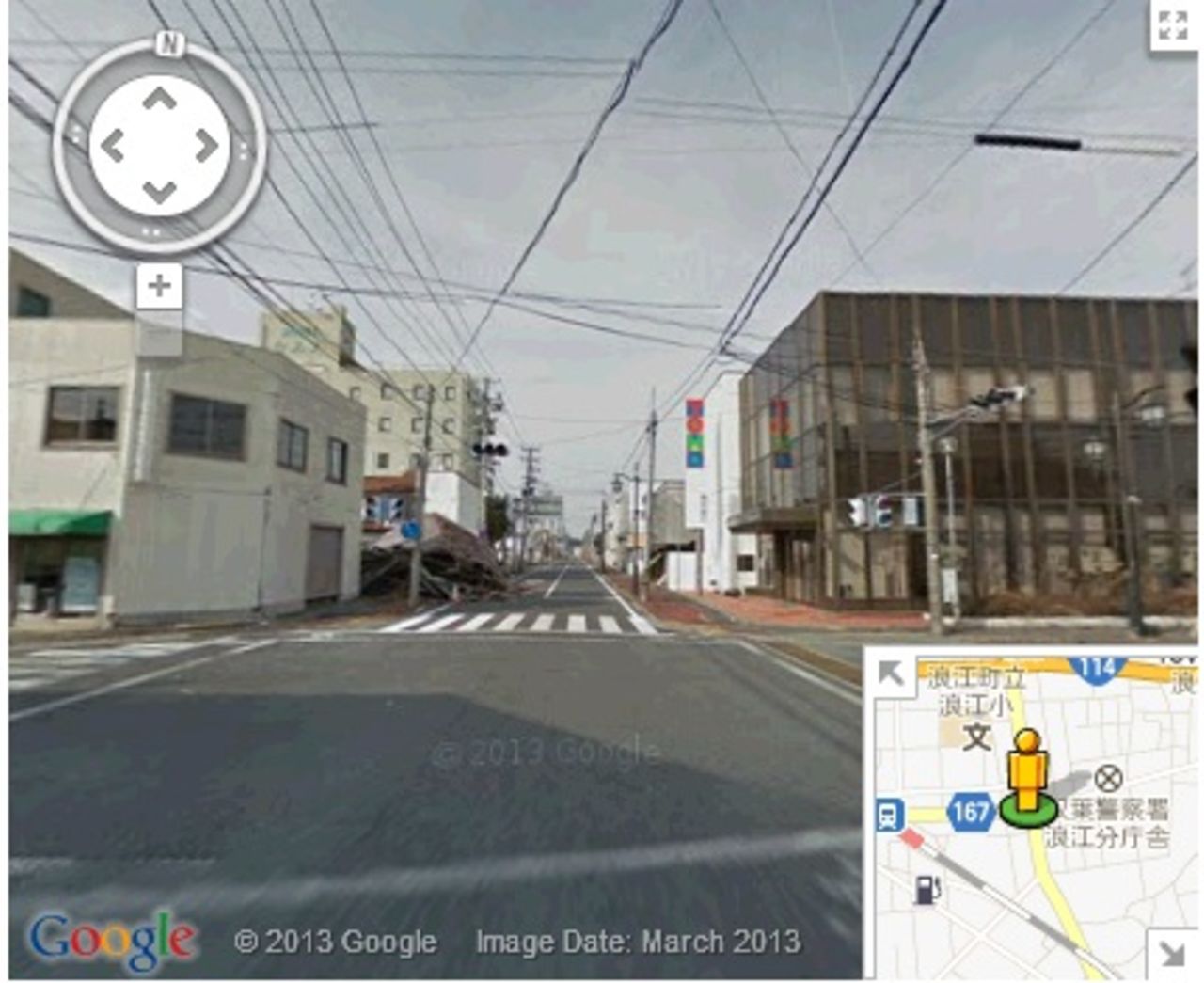 A screen grab from Google Street View of one of Namie-machi's now-deserted main streets.