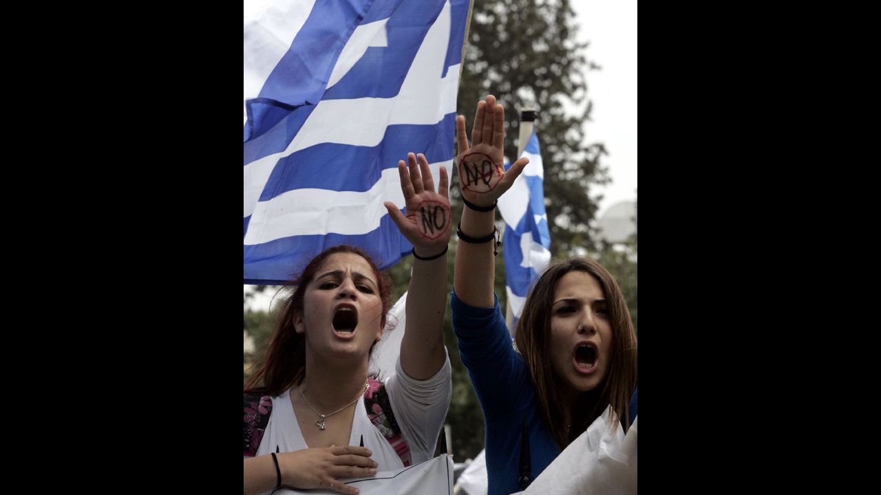Students protest against austerity measures in front of the Cypriot Presidential House on March 26, in Nicosia, Cyprus. 