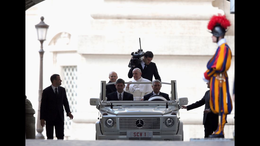 Pope Francis arrives in St. Peter's Square for his first weekly general audience as pope on Wednesday, March 27.