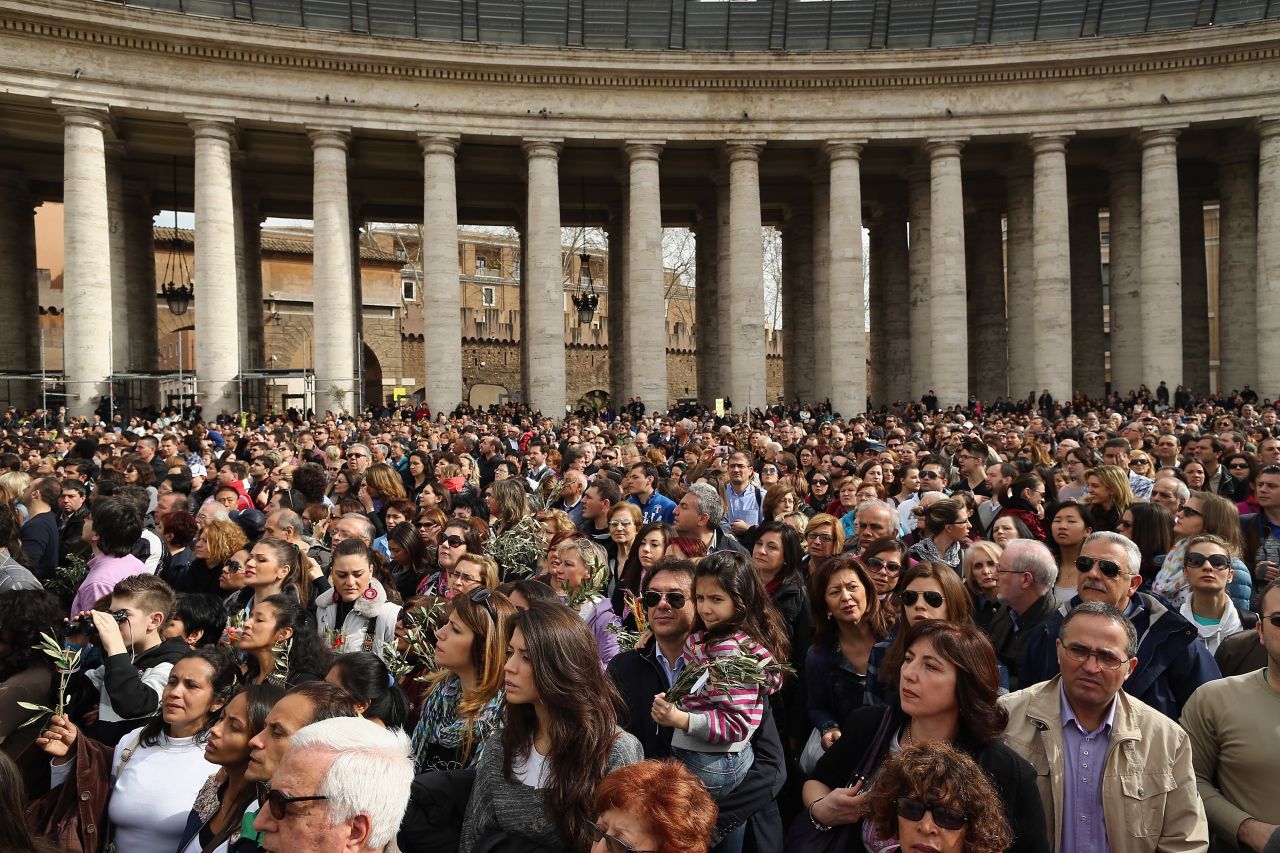 Crowds gather as Pope Francis delivers his blessing on Palm Sunday, March 24.