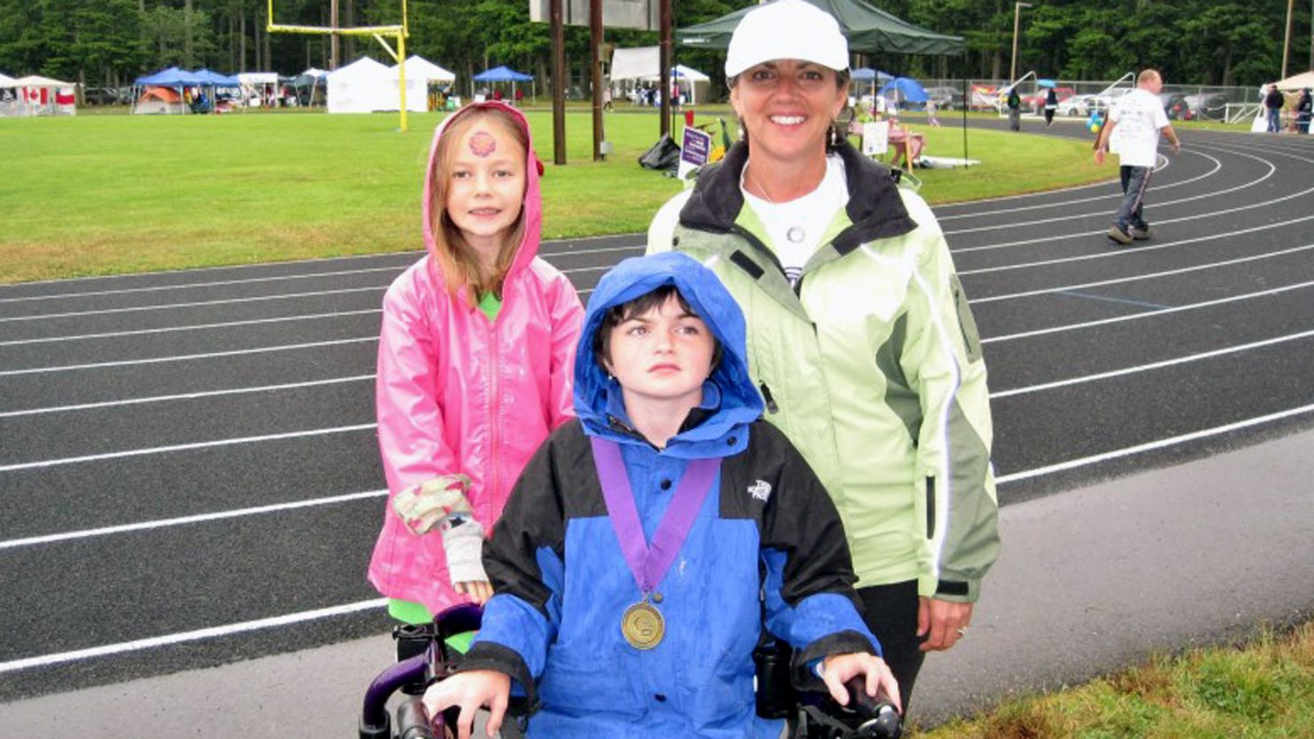 Karry Trout participates in a Relay for LIfe event with her daughters Lucy, 7, and Ella, 13. 