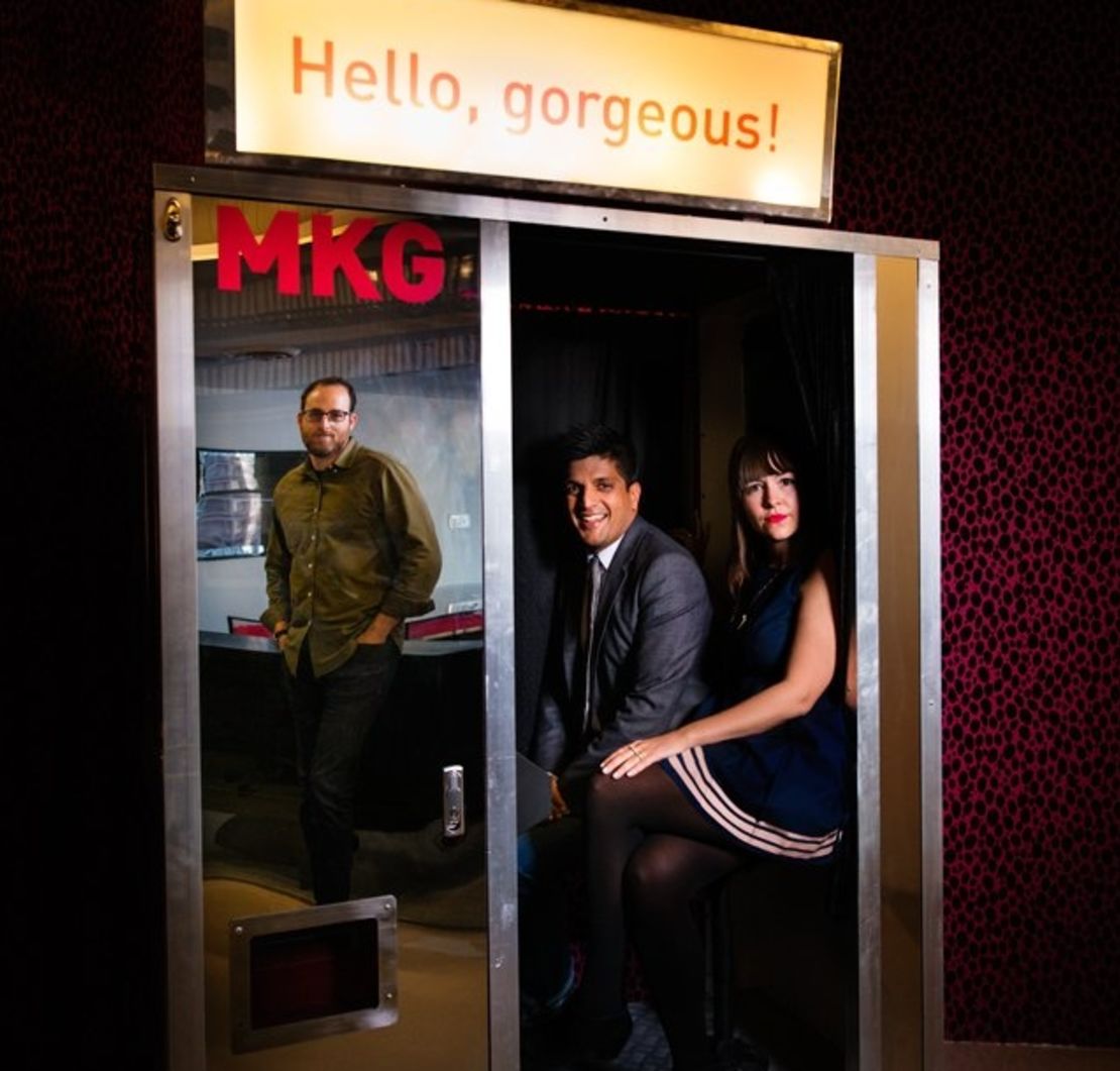 At marketing agency MKG, employees squeeze into their in-office photo booth.