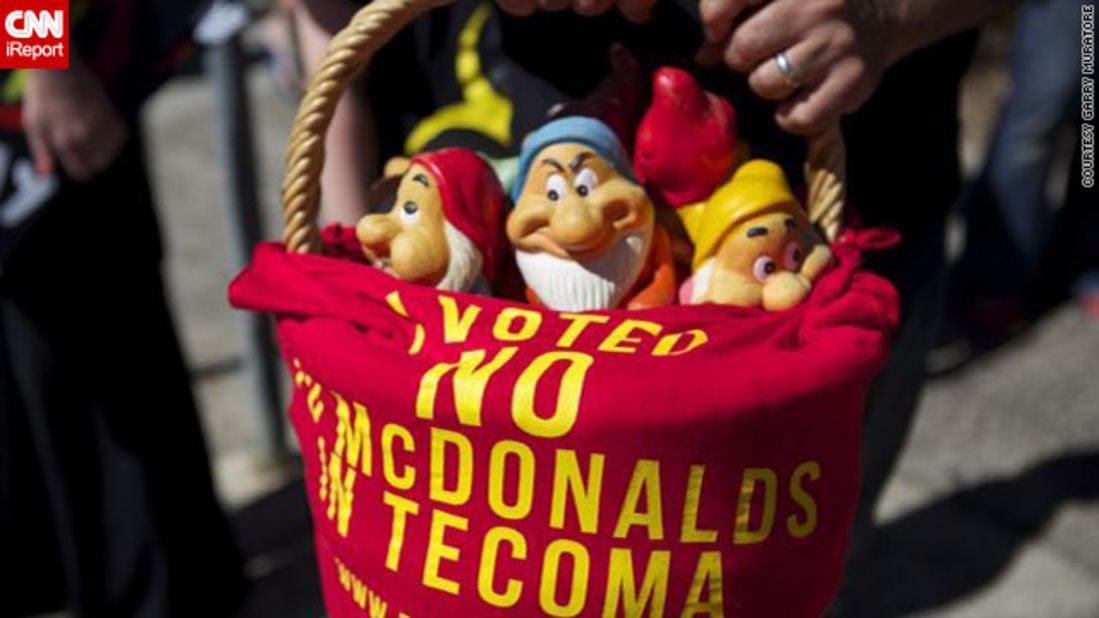 In one protest, campaigners placed garden gnomes on the steps of McDonald's office in the city of Melbourne.