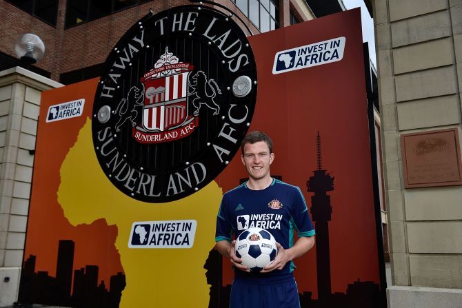 "The image of Africa is often one of poverty and conflict, but there is another reality," added Miliband at the time of the deal's signing. "The African Investment Bank estimates there are 300 million middle-class people in Africa. This is the biggest international venture in the club's history." Sunderland midfielder Craig Gardner is pictured here at the sponsorship launch.