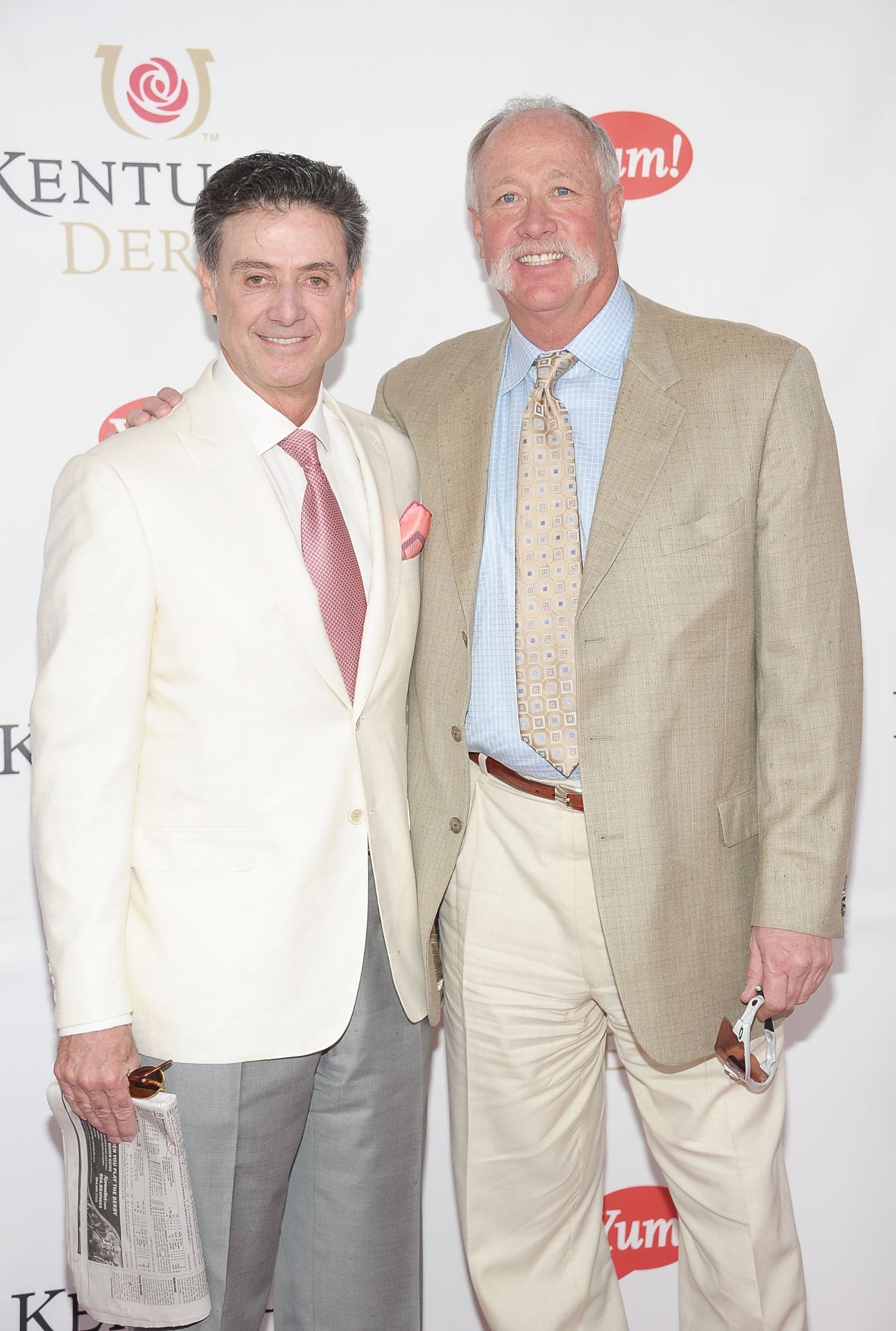 Pitino is pictured arriving at the 2011 Kentucky Derby with former pro-baseball player Richard "Goose" Gossage.