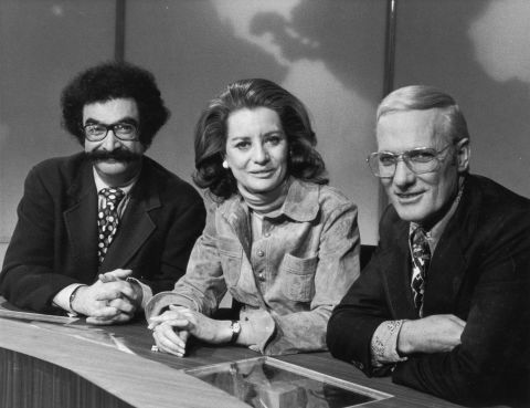 From left, Gene Shalit, Walters and Frank McGee sit behind the news desk in a promotional portrait for the "Today Show" in 1973.  