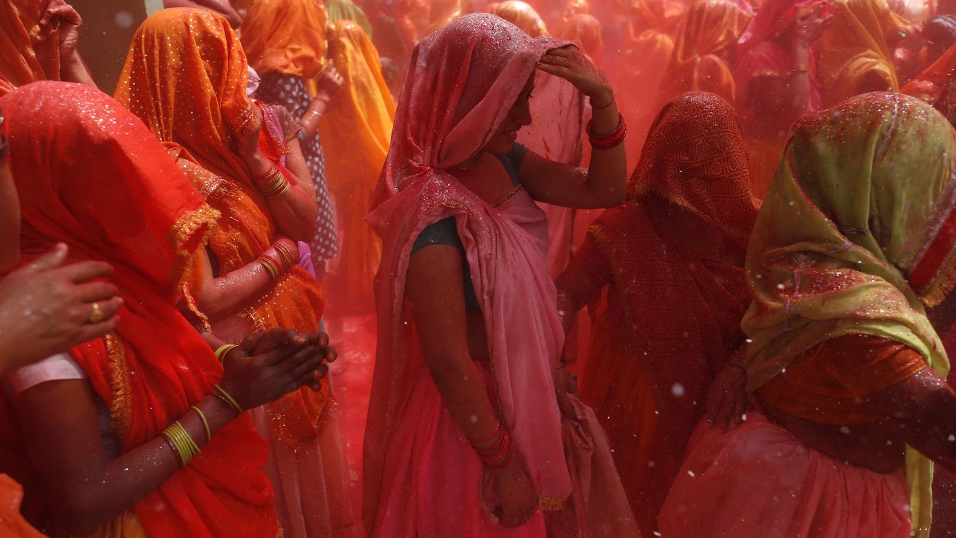 Women take part in huranga at Dauji temple, near Mathura, India, on Thursday, March 28. Huranga is a game played a day after Holi, the Festival of Colors, during which men drench women with colored water and women tear at the men's clothes.