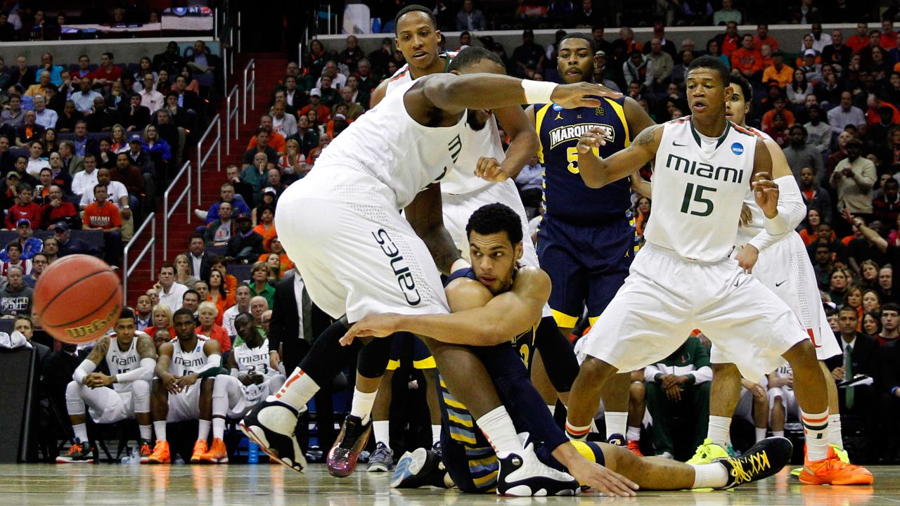 Trent Lockett of the Marquette Golden Eagles passes the ball from the ground against the Miami Hurricanes on March 28 in Washington.
