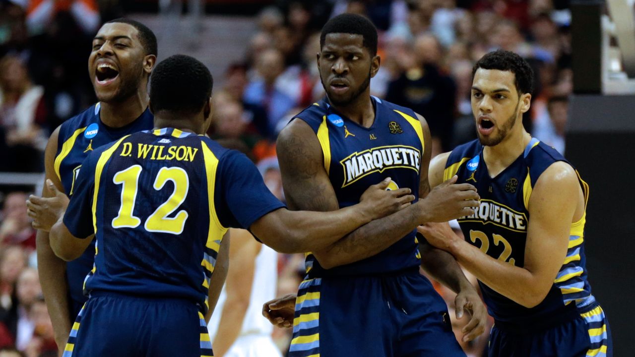 Marquette players, from left, Davante Gardner, Derrick Wilson, Jamil Wilson and Trent Lockett react after a play against Miami on March 28 in Washington.