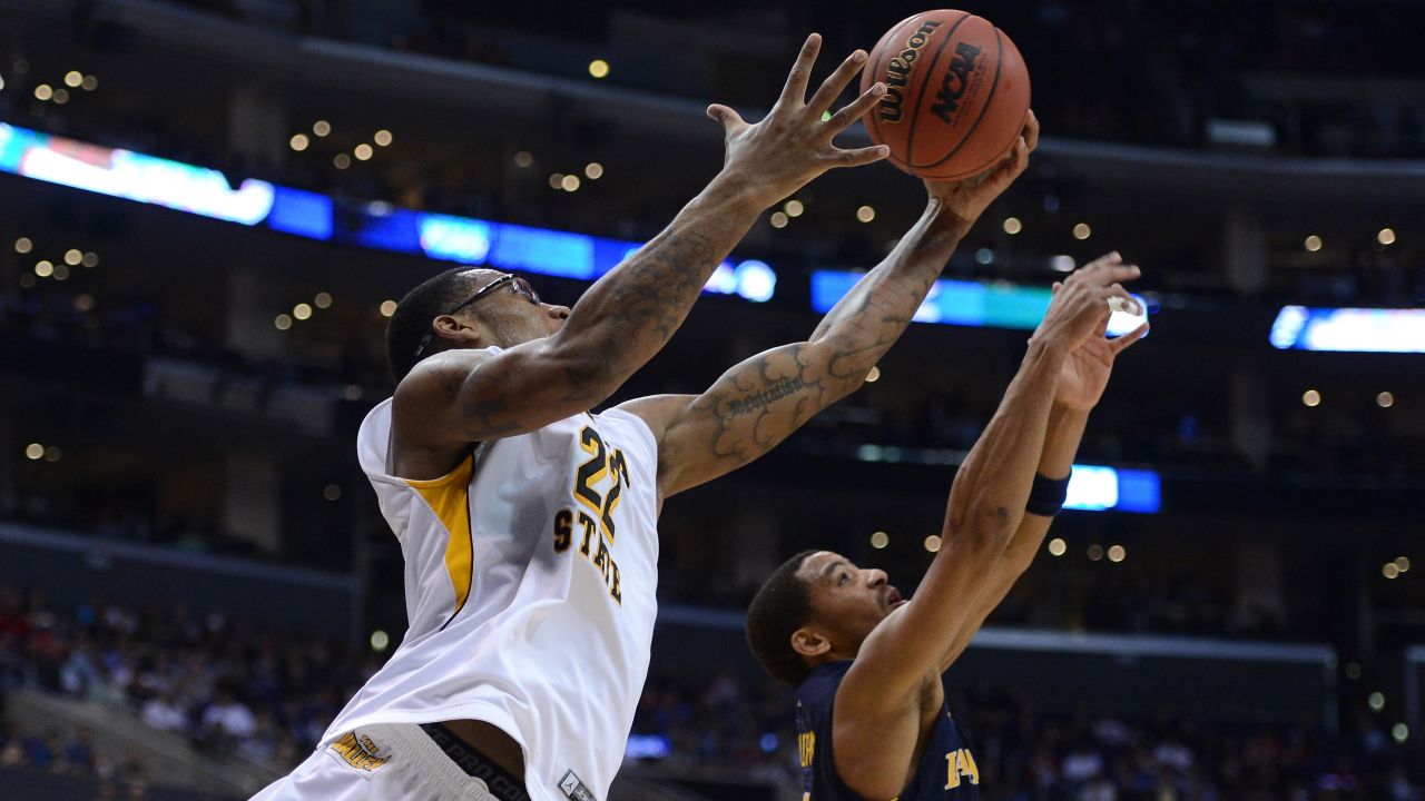 Carl Hall of Wichita State and Tyreek Duren of La Salle go after a loose ball on March 28 in Los Angeles.