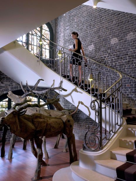 Le Royal Monceau Raffles Paris is just steps away from the Arc de Triomphe and the Champs Elysees. Inside, Nikolay Polissky's hand-crafted reindeer congregate at the bottom of a stairwell.