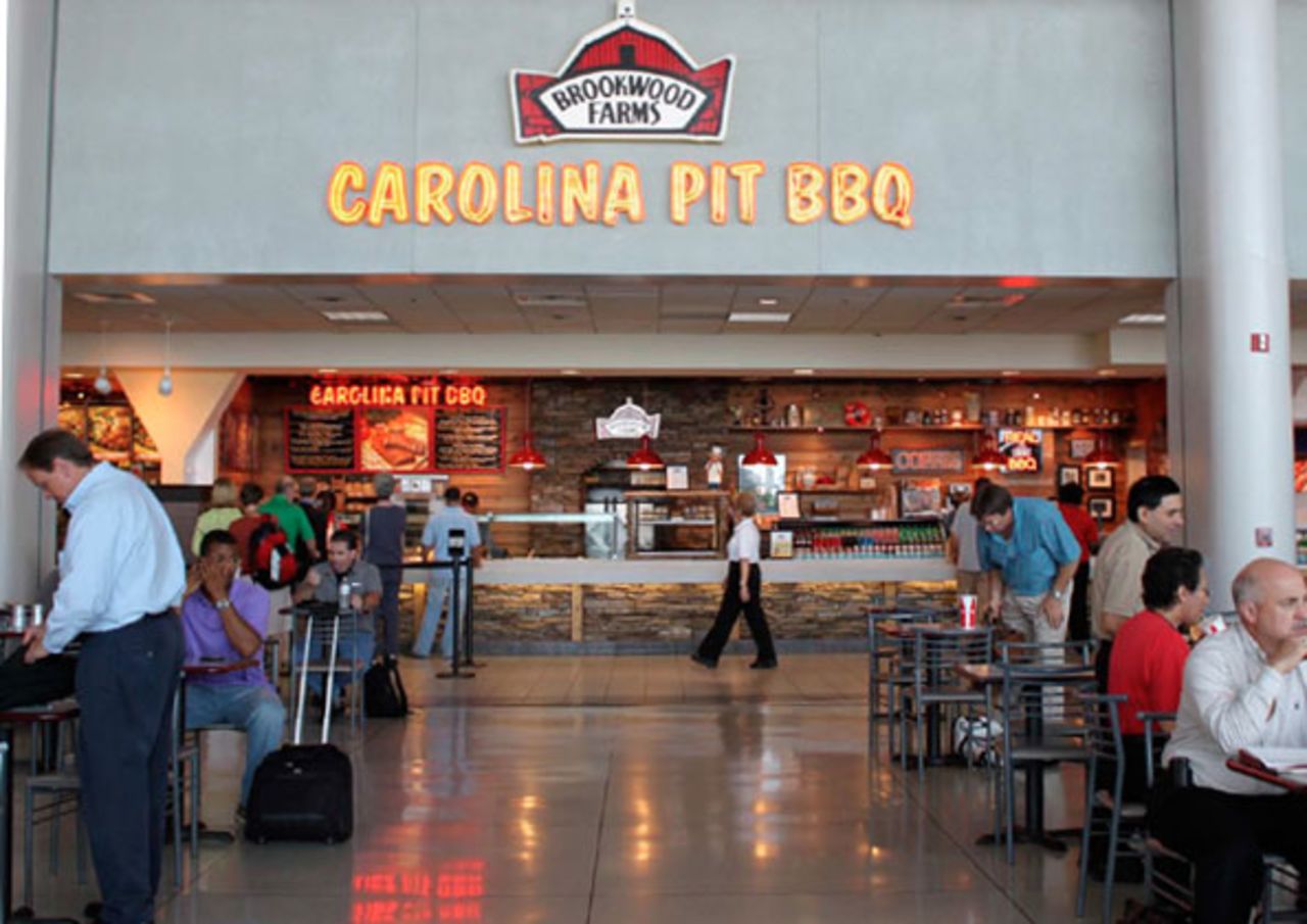 This restaurant taunts travelers with meaty aromas that drift all over Charlotte Douglas International Airport. The restaurant says it can smoke 100,000 pounds of meat per night and pulled pork is the most popular order.
