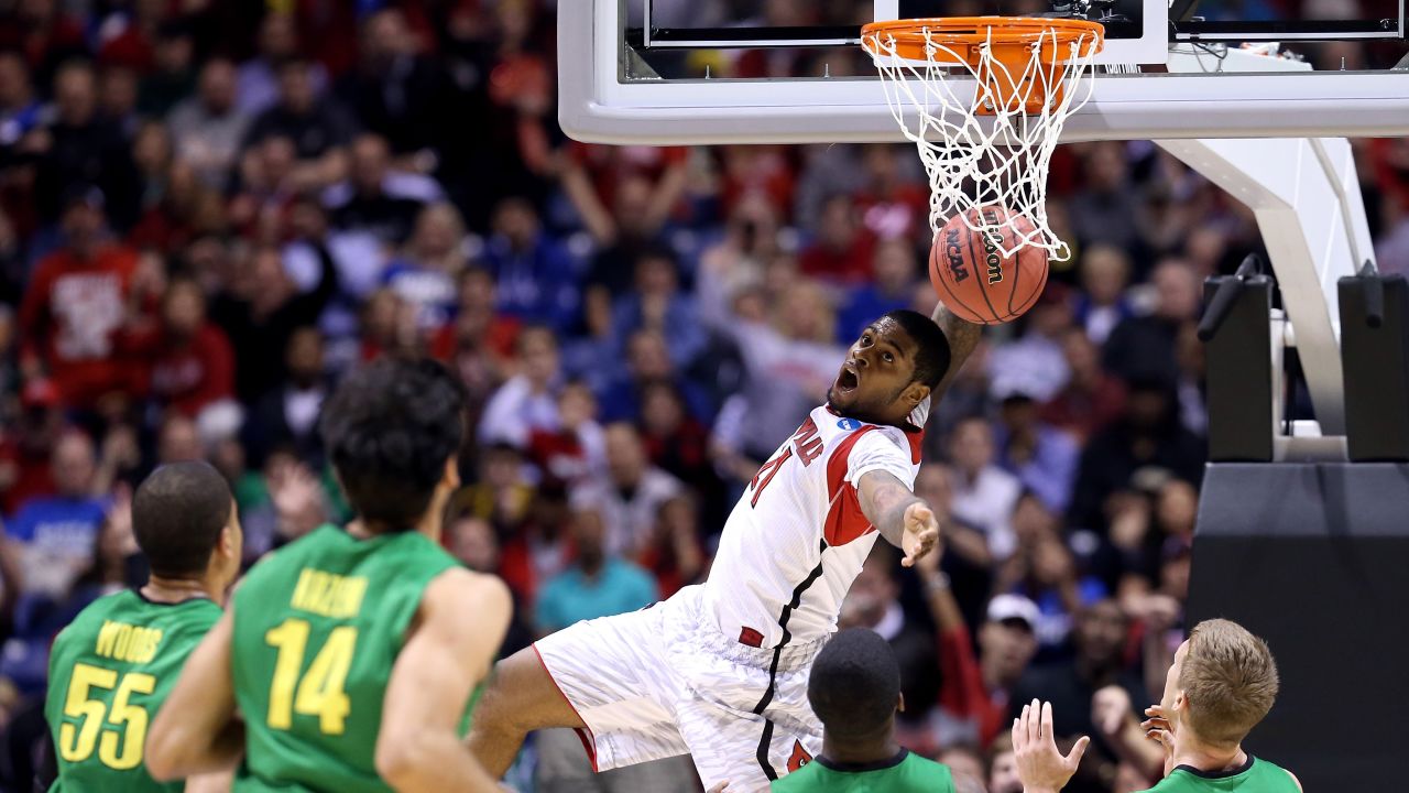 Chane Behanan of Louisville falls back to the floor after dunking the ball on March 29.