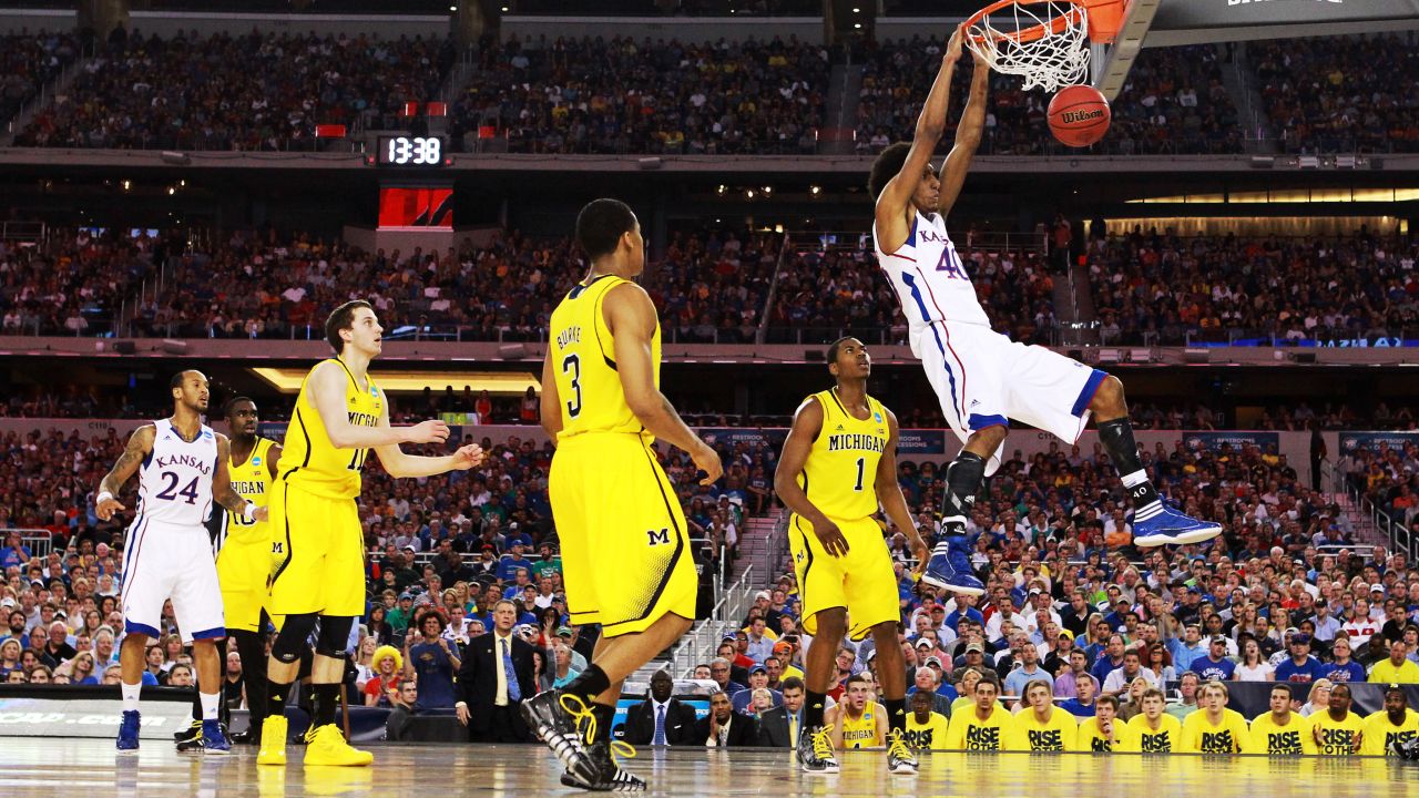 Kevin Young of Kansas dunks against Michigan on March 29.