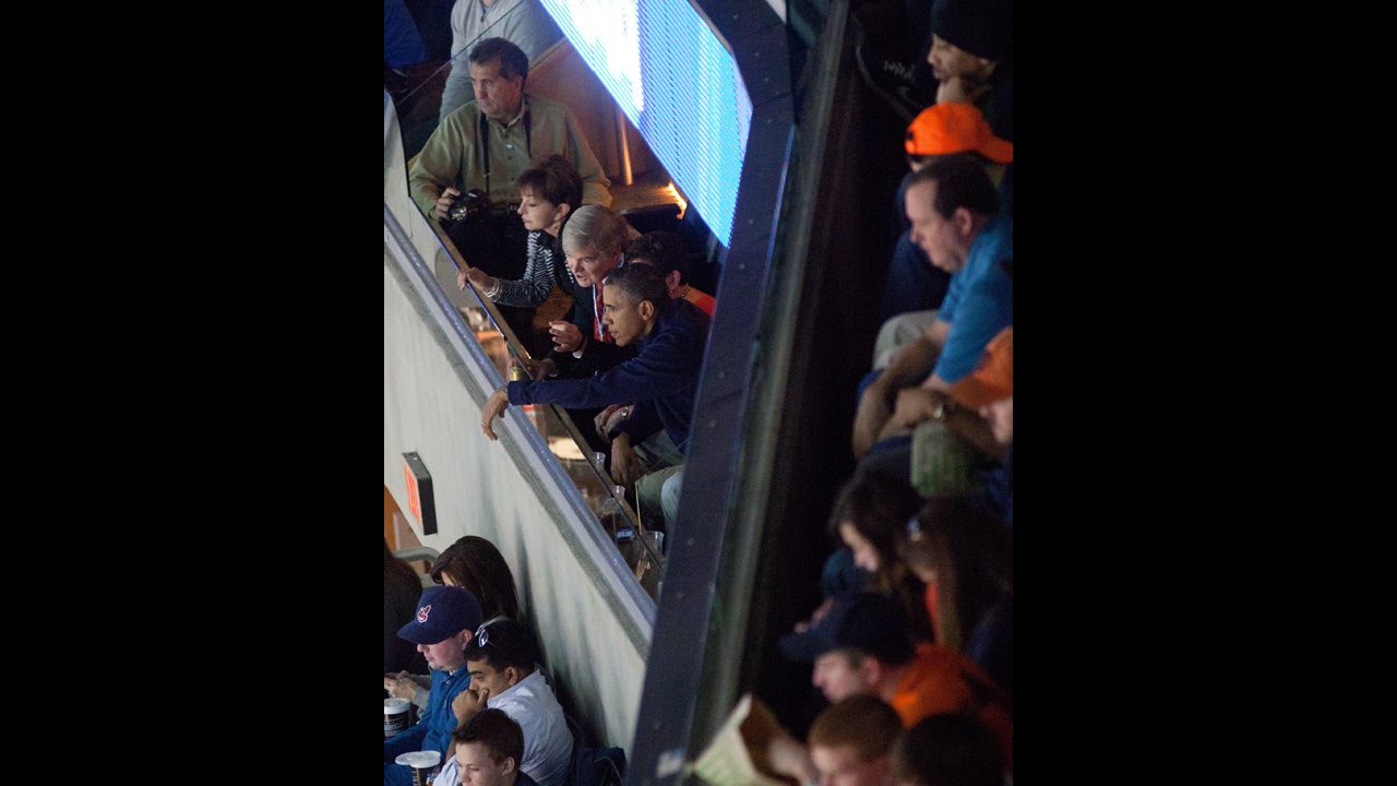 President Barack Obama watches Syracuse take on Marquette on March 30.
