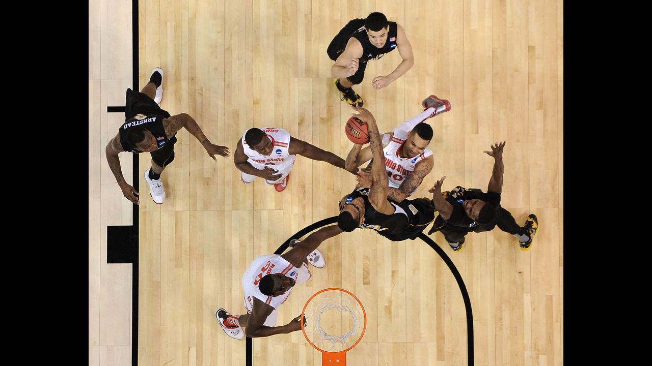 LaQuinton Ross of the Ohio State Buckeyes, middle center, goes up for a shot against the Wichita State Shockers on Saturday, March 30, in Los Angeles. Wichita State defeated Ohio State 70-66.