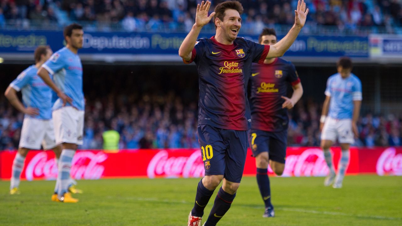 Lionel Messi celebrates another goal and another landmark against Celta Vigo on Saturday. 