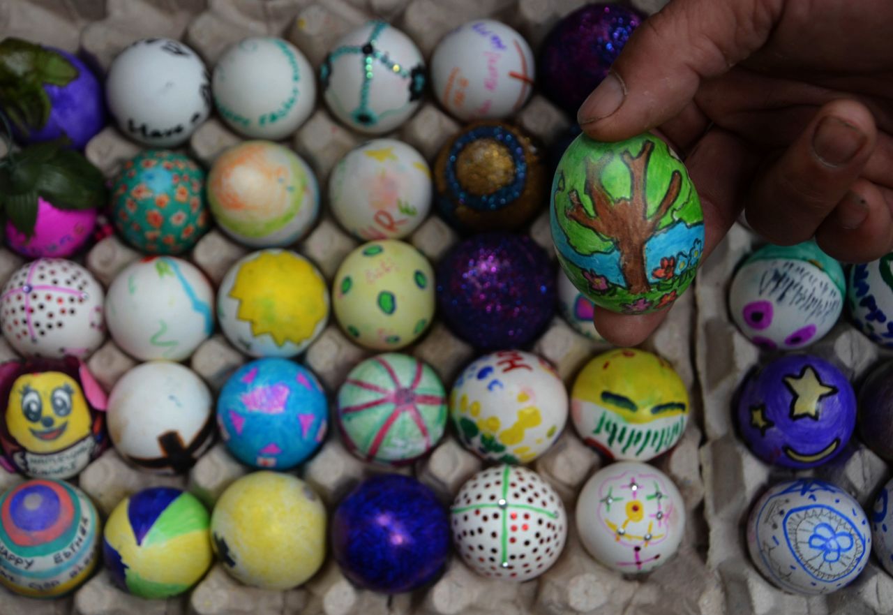 Decorative painted Easter eggs are displayed at a church in Dimapur, India, on March 31. Christians celebrate the resurrection of Jesus Christ with vigils, performances and gifts such as Easter eggs.